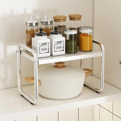Kitchen cabinets and countertop shelves, storage racks, sinks, pots and utens...
