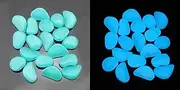 200 pcs Luminous Stone，Each About 1 inch，Absorb Sunlight for More Than 2 Hours and emit Light for 3-6 Hours，Used for bar Decoration; Villa Garden Landscaping, Swimming Pool Decoration, etc.(Blue)