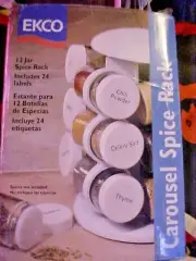 SET OF 6 EKCO SPICE JARS ON A CAROUSEL TURNTABLE. IN BOX