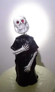 J.H. MILLER HALLOWEEN BOBBLE HEAD SKELETON W/GLOWING AUSTRIAN CRYSTAL RED EYES