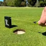 The Player's Line - Retractable string line training aid for improving putting.