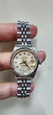 在飛比找Yahoo!奇摩拍賣優惠-勞力士 rolex 69174 原裝十鑽包台 女錶