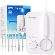 Irrigador bucal con agua y 3 modos de limpieza.