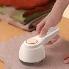 Electric Fabric Shaver with 6 Leaf Cutter Head and Convenient Storage Solution