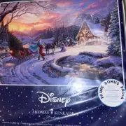 Thomas Kinkade Disney 1000 piece puzzle, “Cinderella Bringing Home The Tree.”