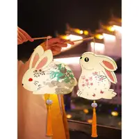 在飛比找ETMall東森購物網優惠-兒童手提發光兔子燈玉兔燈中秋節裝飾燈籠幼兒園手工diy卡通花