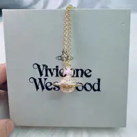 在飛比找蝦皮購物優惠-Vivienne Westwood 新款粉色立體星球項鍊女輕