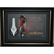 CADEL EVANS SIGNED AND FRAMED TOUR DE FRANCE RACING BIKE SEAT 'THE CONQUERER'