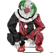 HALLOWEEN ANIMATED CROUCHING RED CLOWN PROP HORROR CEMETARY
