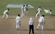 West Indies captain Brian Lara dives to take the ball one-han- Old Cricket Photo