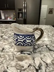 COBALT BLUE WHITE CERAMIC CREAMER PITCHER THICK GOLD HANDLE GILT RIM 4 FOOTED