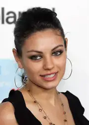 Actress Mila Kunis arrives at the launch of the uBid for Hurricane - Old Photo 1