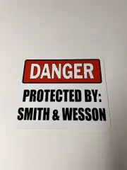 Danger Protected by Smith and Wesson ALUMINUM sign