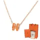 【Hermes 愛馬仕】H147992FO 02 經典Mini Pop H立體簍空橢圓LOGO玫瑰金邊項鍊(橘色)