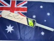 Aaron Finch (Australia) signed New Balance (Blue/Yellow) mini cricket bat + COA