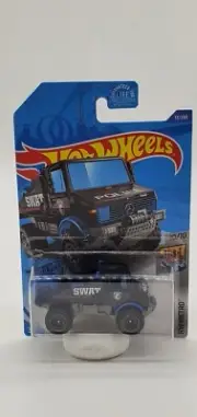 Hot Wheels HW Metro #33/250 Mercedes-Benz Unimog 1300 Treasure Hunt Police SWAT