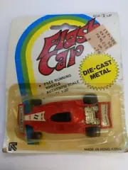 VINTAGE FLASH CAR DIE CAST METAL FERRARI FORMULA ONE ON ORIGINAL CARD HONG KONG