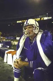Baltimore Colts QB Bert Jones on sidelines bench during game vs Ho - Old Photo