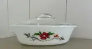 vintage Pyrex casserole dish with a lid, specifically the "June Rose"