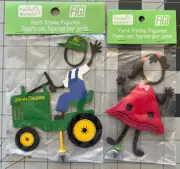 Lot of 2: Family Matters FIGI Yard Stake Figures John Deere Mower & Girl Figures