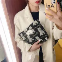 在飛比找蝦皮購物優惠-韓國時尚色織提花豹紋斑馬紋化妝包 手拿包 手機包 萬用包隨身
