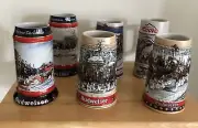 5 - Budweiser Holiday Steins + a Coors Stein