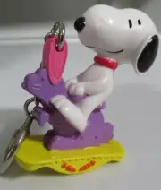 Snoopy Peanuts Easter PVC Ornament Whitman's Key Chain Rocking Horse Bunny