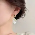Beautiful Gold Alloy Ear Pendants with Unique Shell and Floral Designs