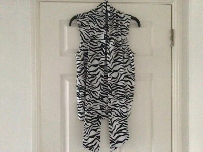 Ladies tie neck black & white top. Fitted with good stretch. High neck. Size 12