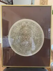 Aztec calendar embossed on suede
