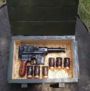 Gift set bottle "Mauser C96 Pistol" with ceramic liquor glasses in a wooden box