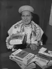 Marie Besnard signs copies autobiography 'Mes M�moires' a books- 1962 Old Photo