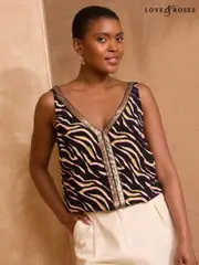 Love & Roses Monochrome Zebra Petite Sequin Trim Vest (F73037) | $74