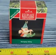 Stringing Along 1990 Miniature Hallmark Ornament QXM5606