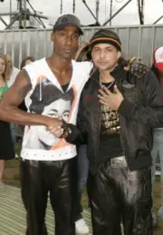Simon Webbe from Blue and Sean Paul pose backstage at 958 Capital- 2004 Photo