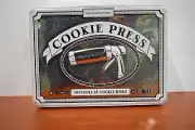 Williams Sonoma Cookie Press w/18 Cookie Disks in storage tin box.