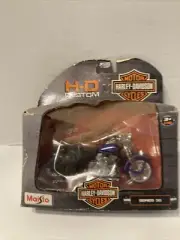 MAISTO 1:18 HD HARLEY DAVIDSON 1999 FLSTS HERITAGE SOFTTAIL SPRINGER (SERIES 35)