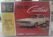 New AMT '64 Olds 442 Cutlass 3n1, 1/25 Scale Model Kit #1066/12 Sealed Bags