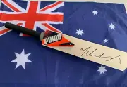 Mitch Marsh (Australia) signed Puma Evo Speed mini cricket bat + COA