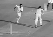 Kent bowler Bernard Julien looks for a possible run out as K - Cricket Old Photo