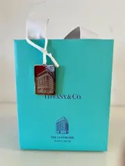 Tiffany &Co. Flagship Bag Charm 1.5”x 1” + Shopping Bag 6”x5x”x3” Brand New