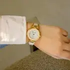 Anne Klein Women's AK/2512LPGB Diamond-Accented Gold-Tone Blush Pink Watch