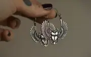 Double sided sacred silver scarab beetle hoop earrings. Egyptian tribal inspired