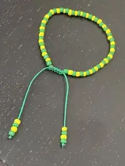 IDDE Orula bracelet yellow and green. Orula Hand. Mano de Orula. Ilde.
