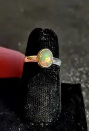 Oval Welo Opal Cabochon 8x6mm, .78ct set in Sterling Silver