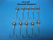 1/2oz - 14.1 grams Jig Heads 4/0 Chemically Sharpened Hooks 8 per packet.