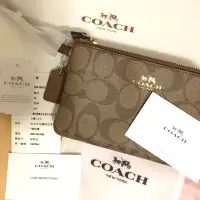 在飛比找蝦皮購物優惠-高雄義大購入 全新 coach 手腕包/錢包