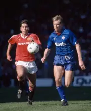 Neil Webb of Manchester United chases Andy Holden of Oldham Athlet- Old Photo