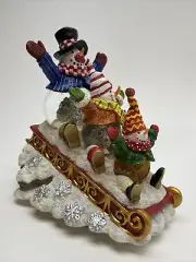CHRISTMAS SNOWMAN SLEDDING MUSIC SNOW GLOBE, By Bill Cleaver