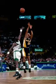Reggie Miller Indiana Pacers shoots over Xavier McDaniel Boston Ce- Old Photo 1